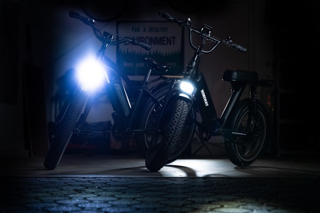 A motorcycle parked in a dark room