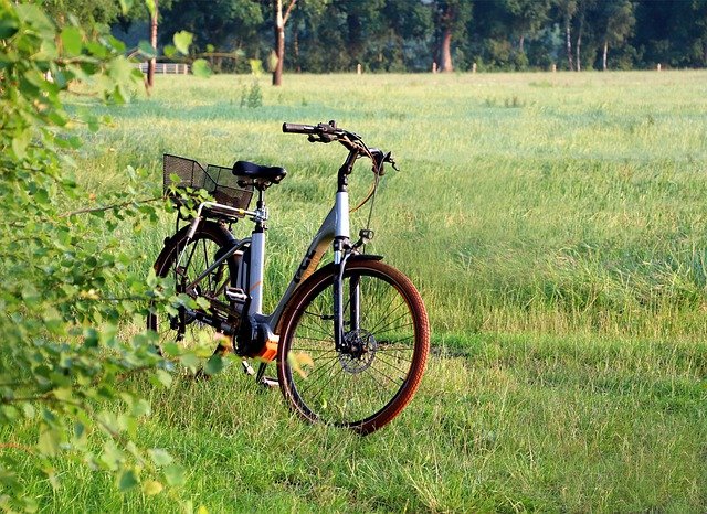 A bicycle parked on a field